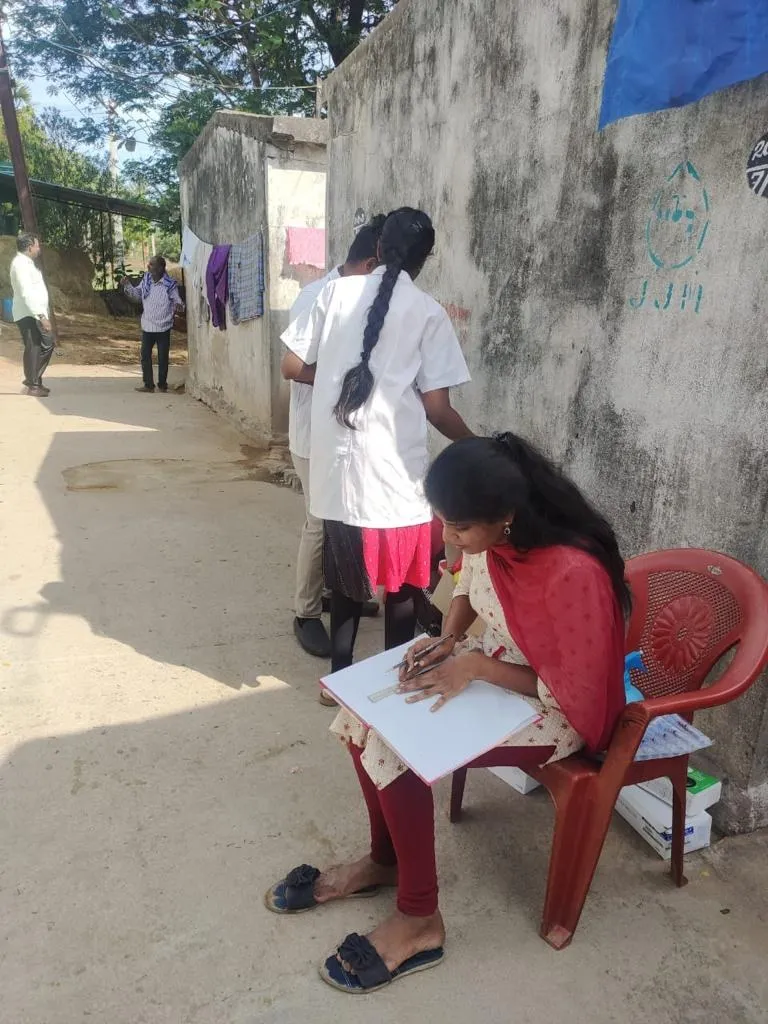 Consultation in progress at a village camp